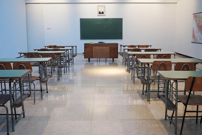 empty classroom with desks