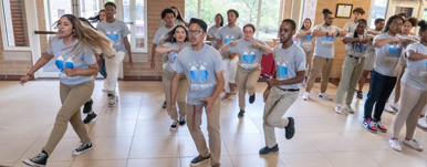 students dancing at a Robert Smith event