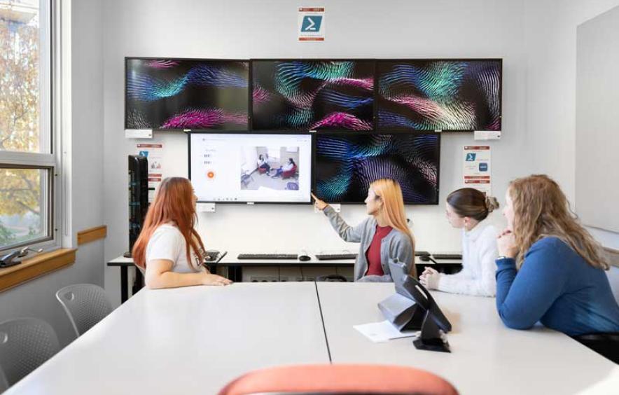 MCE students and faculty observe a research interview