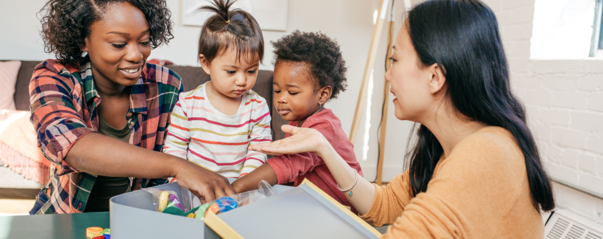 Two women and two young children