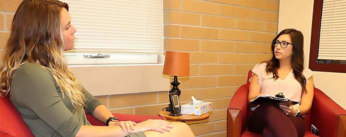 Two women in a counseling session